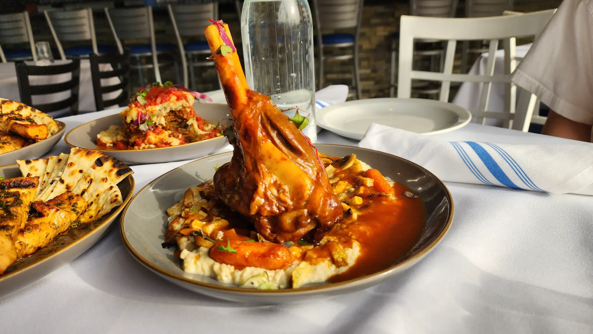 Cabernet Braised Lamb Shank - Slow-braised Cabernet lamb shank with herbs and red wine reduction